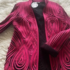 Stunning formal jacket. Construction allows for stretch.